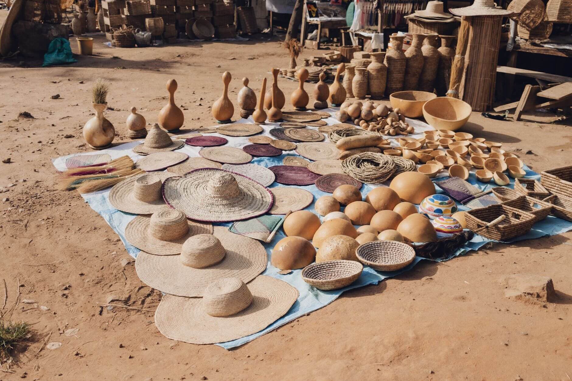 Colorful African crafts and wax fabrics at Dakar market in Senegal